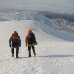 Scottish winter climbing Camo and Dave heading down from the summit of Cairn Gorm